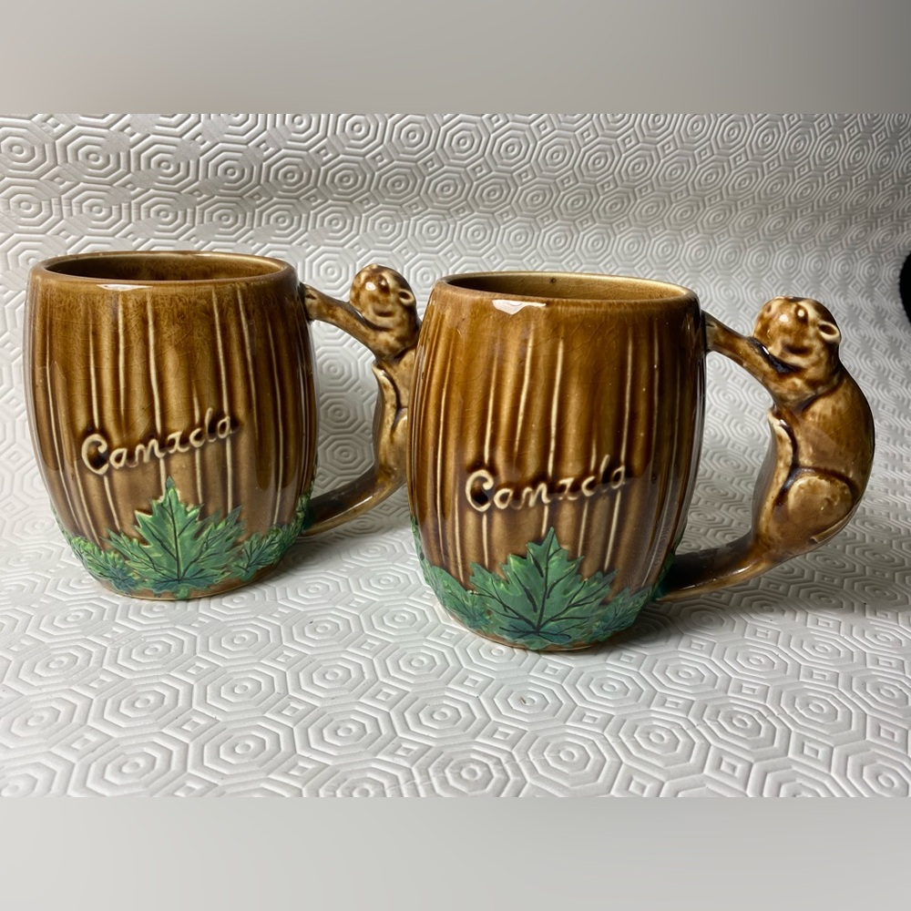 Pair of two vintage Canada Beaver mugs beaver handle